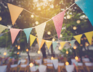 Blur background colorful triangular flags of decorated celebrate outdoor party, vintage tone. - obrazy, fototapety, plakaty
