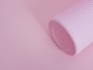 Pink tube of cream on a pink background. Minimalism.