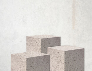 beige terrazzo stone step podiums for product pressentation mock up, stone stage for showing cosmetic product displayed with white rust stucco concrete wall as background, light from above.