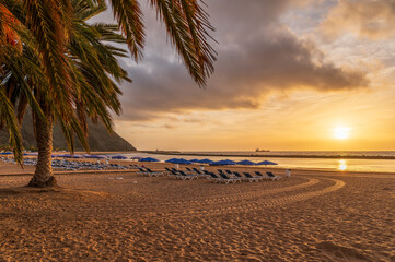 Explore the serene Las Teresitas Beach with its golden Sahara sands, nestled by Tenerife lush Anaga...