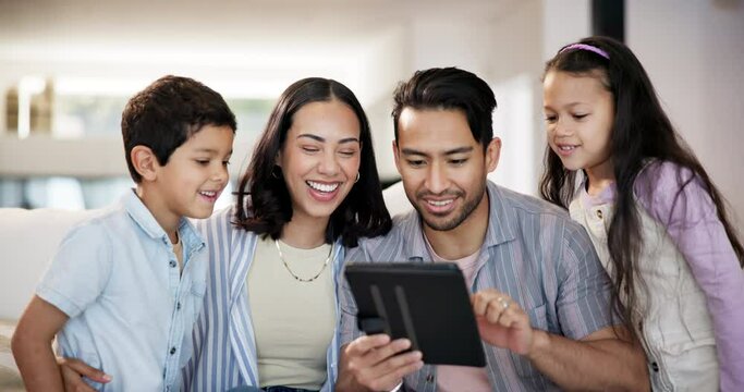 Tablet, happy and children with parents on sofa choosing movie, film or show on internet at home. Smile, excited and kids with mother and father to select video on digital technology in living room.