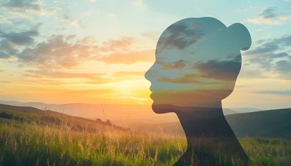 Poster Outline of a human head containing a serene landscape background, symbolizing the concept of inner peace and mental tranquility with copy space © thiraphon