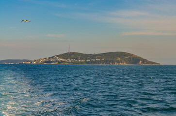 Fototapeta na wymiar Kinaliada island scenic view from Istanbul ferry boat (Adalar, Turkey)