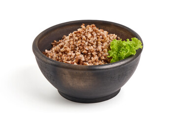 Buckwheat in a pot, isolated on white background.