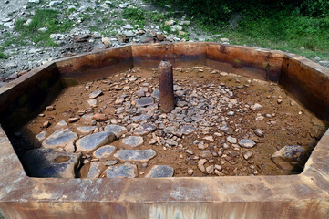 Geyser that erupts several times a day with a powerful jet of water in Petrovets tract, village of Vuchkove in Transcarpathia, Ukraine.