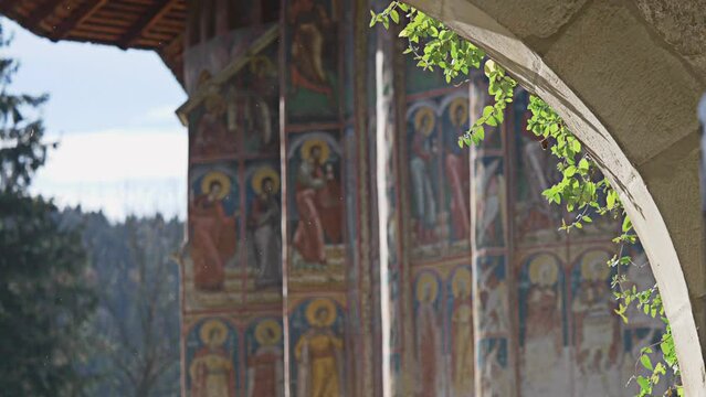 Focus shift on mural paintings detail of Moldovita Monastery in Bukovina