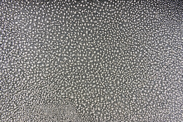 Frost texture background on dark surface