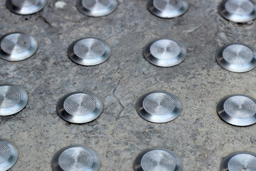 Cement fllor with tactile ground surface indicators