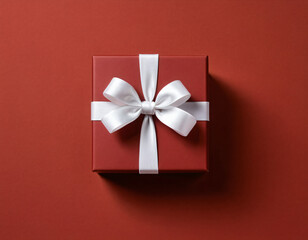red gift box,burgundy gift box with a satin ribbon on a matching deep red background, conveying a luxurious and celebratory feel, ideal for special occasions. Generative AI.