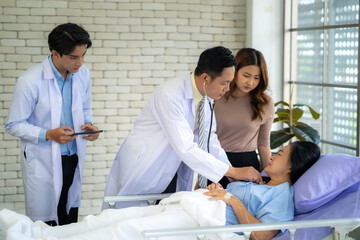 The doctor is currently examining and treating the patient, ready to provide consultation.
