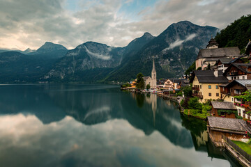 Fototapeta na wymiar Small Town of Hallstatt reflecting in the water, Gmunden, Upper Austria