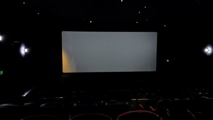 Cinema screen in an empty movie theatre.