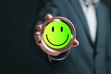 Customer experience concept. Businessman give excellent ratings with smiley face emoticons for...