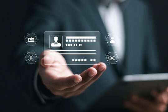 Digital identification or digital ID concept. Businessman show virtual screen of digital identification card to accessing databases by digital identity for cyber security.