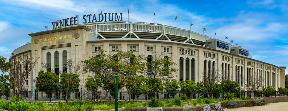 New York, USA; June 3, 2023: Spectacular panoramic view on a sunny day with blue sky of the famous Yankee baseball stadium in the Bronx.