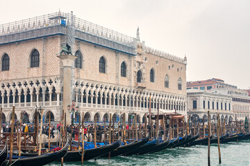 Gondolas near St. Mark's Square in Venice, Italy. Travel photo