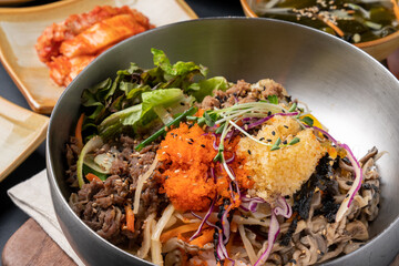 Korean food, soybean paste stew, spicy pork, bibimbap, side dishes, vegetables, kimchi, earthen pot,