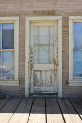Fototapeta na wymiar front door of abandoned building in ghost town