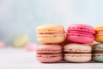 Fototapeta na wymiar Assorted macarons on a light surface, pastel background. Concept for bakery or patisserie promotion, dessert menu highlight. Copy space available.