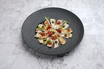 Octopus carpaccio. Seafood dish