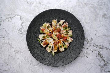Octopus carpaccio. Seafood dish