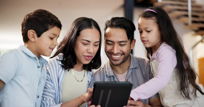 Tablet, happy and kids with parents on sofa choosing movie, film or show on internet at home. Smile, excited and children with mother and father to select video on digital technology in living room.