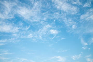 Blue sky background with beautiful white cloud in sunny day summer season. Nature and save...