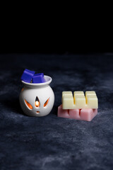 Colorful melting candles in various scents.