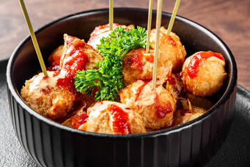 Fried Mozzarella Cheese Balls with Sauce in bowl