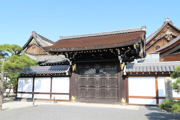 Fototapeta na wymiar Shoin Gate in Nishi Hongwanji Temple, Kyoto, Japan (Japanese words on the stone statue mean 