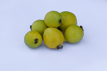 Red guava fruit on a white background, red guava is an alternative for traditional medicine