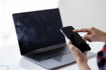 business hand use laptop to working about growth finance report of new startup project.
