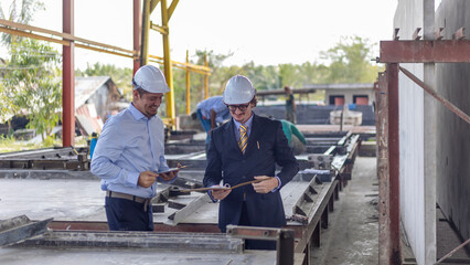 Factory owner discusses with his engineer to design for a new construction product. Supervisor provides technical advice to his manager in a factory - obrazy, fototapety, plakaty