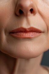 A close up of a woman's face with a toothbrush in her mouth. Suitable for dental hygiene and oral care concepts