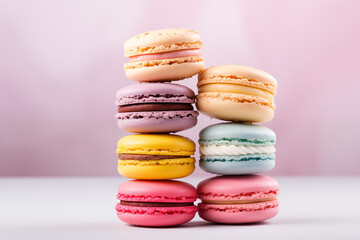 Fototapeta na wymiar vibrant macarons stacked against a soft pink backdrop. Concept for bakery, dessert menu or sweet treat promotion.