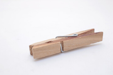 a Wooden clothes peg isolated on white background
