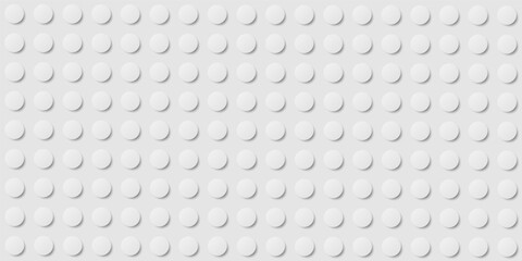 Fototapeta premium White plastic construction plate with white circles, geometric circle white wallpaper, seamless modern design abstract background, closeup plastic toy block, white abstract 3d round spheres