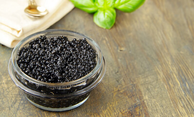 delicious appetizer black caviar in a bowl