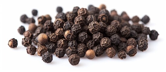 Obraz premium Black Pepper Corns on Isolated White Background - Aromatic Black Pepper Corns on a Serene White Background, Perfect for Seasoning
