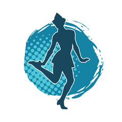 Silhouette of a female dancer in action pose. Silhouette of a woman dancing happily.