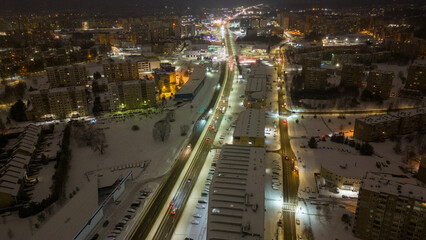 Fototapeta na wymiar Drone photography of snow cityscape during winter morning