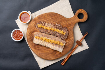 Korean food, bossam, suyuk, garlic, pork, steamed pork, jokbal, feet, ssamjang,