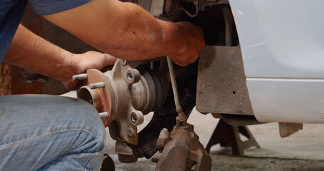 Close up Man hands fixing Car machinery vehicle mechanical service. Mechanic man hands repairing car auto repair shop. open vehicle hood checking up auto mobile. Vehicle Car maintenance engineer.