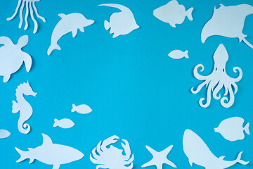 blue background with animal cut out paper frame