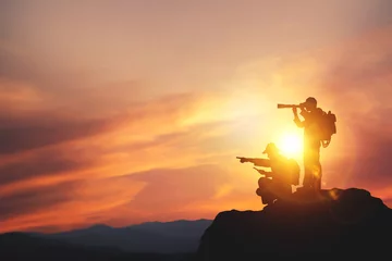 Türaufkleber Vision for success ideas. businessman's perspective for future planning. Silhouette of man holding binoculars on mountain peak against bright sunlight sky background. © Midnight Studio