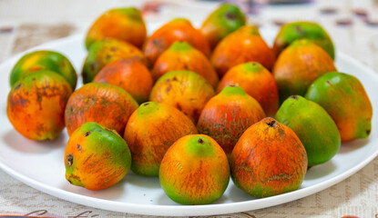 Rare and exotic fruit of the peach palm (Bactris gasipaes), typical fruit of the Brazilian tropical forests, Amazonas, Pará, Rondônia and Acre