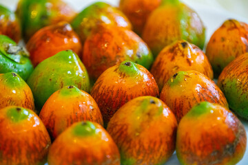 Rare and exotic fruit of the peach palm (Bactris gasipaes), typical fruit of the Brazilian tropical forests, Amazonas, Pará, Rondônia and Acre