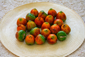 Rare and exotic fruit of the peach palm (Bactris gasipaes), typical fruit of the Brazilian tropical forests, Amazonas, Pará, Rondônia and Acre