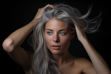 A young girl with long grey hair