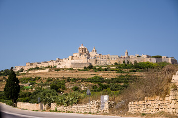 Mdina, fortified city, seen from below. One of Malta's main tourist destinations - 727852352